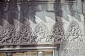 Angkor Wat temple, the fourth enclosure, the bas reliefs of the west gopura, friezes of figurines mounted on a variety of animals